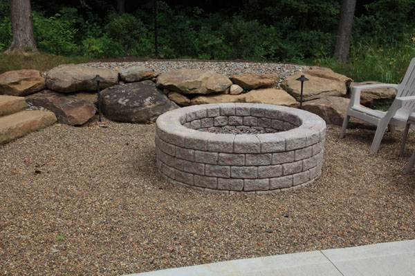 Wood Burning Firepit in Gravel Patio